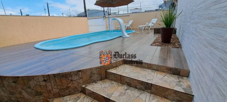 Imagem Sobrado com 4 dormitórios à venda, 246 m² por R$ 1.000.000,00 - Jardim Aruan - Caraguatatuba/SP