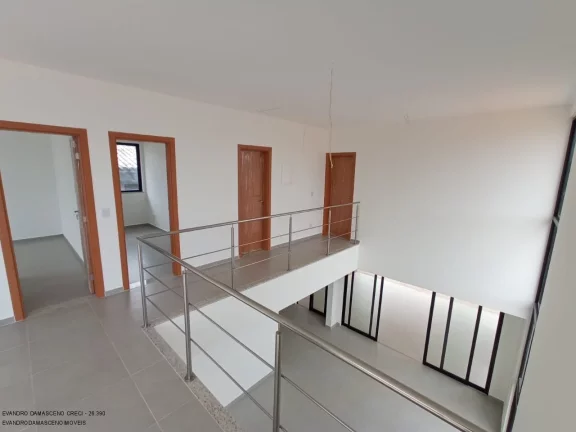 Imagem Luxuosa casa em condomínio à venda em Lauro de Freitas-BA, no bairro Buraquinho, com 4 quartos, 4 suítes, 2 salas, 1 banheiro, 2 vagas de garagem e 350m² de área.