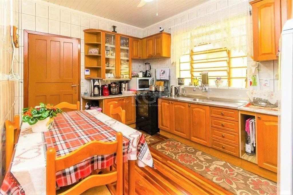 Imagem Casa para Venda - 148m², 2 dormitórios, 1 vaga - Partenon