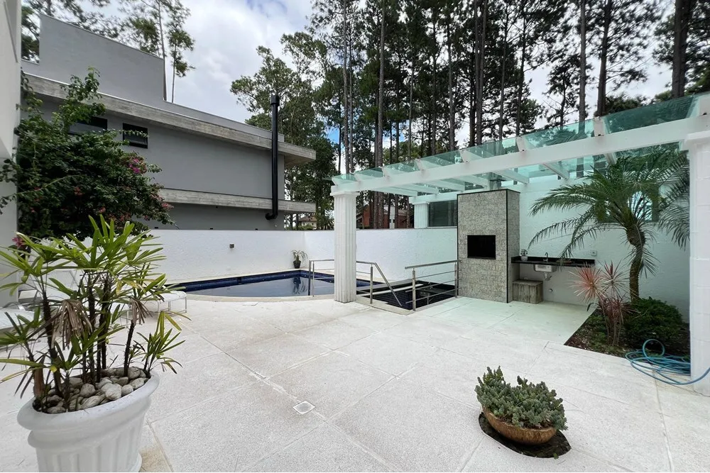 Imagem Casa de condomínio à venda em Xangri-Lá, Praia de Atlântida, com 4 quartos, 405m2