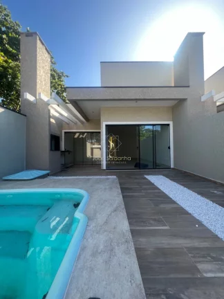 Foto do imóvel Casa a venda em Guaratuba a 50 metros do mar, em rua asfaltada, com piscina, churrasqueira, fino acabamento. em Rua Visconde do Rio Branco