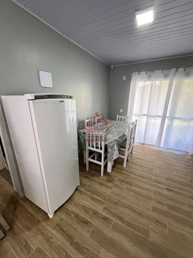 Imagem Casa 2 dormitórios com suíte a 580m do mar no Mariluz