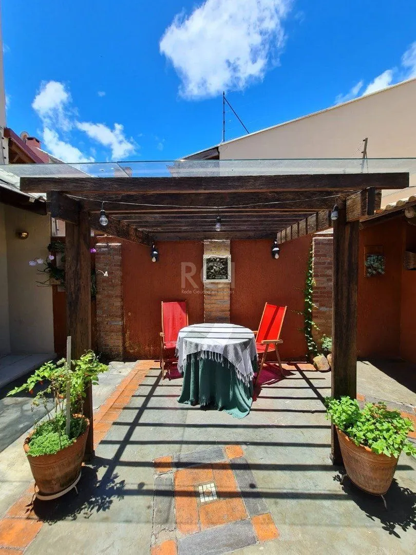 Imagem Casa para Venda - 182m², 3 dormitórios, sendo 3 suites, 2 vagas - Guarujá/ Portal do Guarujá
