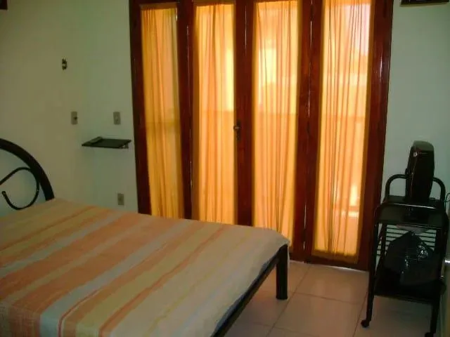 Imagem Casa em Condomínio para Venda em Cabo Frio / RJ no bairro Peró