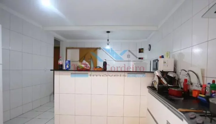 Imagem Sobrado com 3 dorm. + 2 vagas cobertas - Jd. Santos Dumond