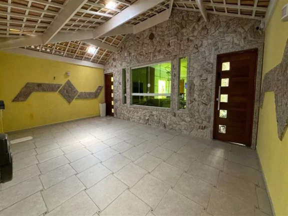 Imagem Casa com 3 dormitórios à venda, 157 m² por R$ 1.249.000 - Caiçara - Praia Grande/SP