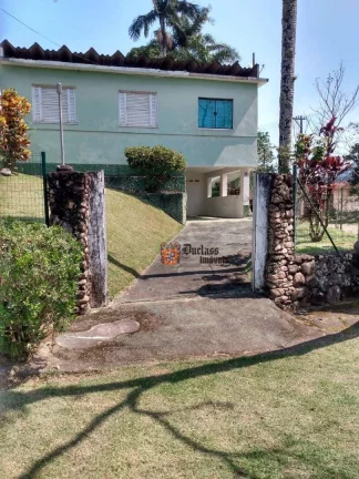 Imagem Casa com 2 dormitórios à venda, 113 m² por R$ 650.000 - Massaguaçu - Caraguatatuba/SP
