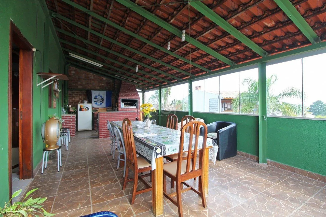 Imagem Casa para Venda - 339m², 3 dormitórios, 2 vagas - Vila Nova, Porto Alegre