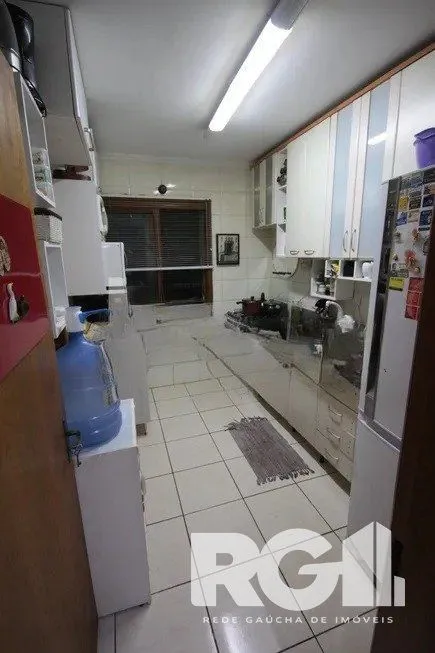 Imagem Casa residencial com 3 dormitórios 90m² privativos, e 2 vagas à venda no bairro Parque Santa Fé em Porto Alegre