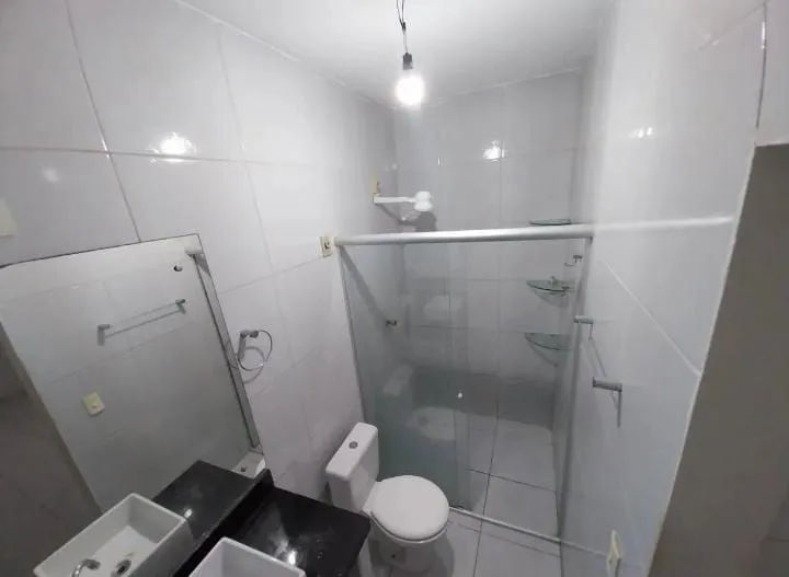 Imagem Casa Duplex em Brisamar com 3 suítes, piscina, varanda, cozinha americana e localização privilegiada próxima às praias.