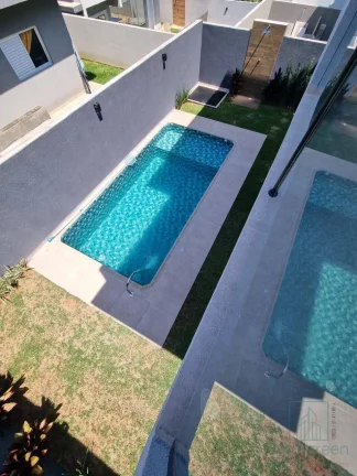 Imagem Casa 3 suítes e 4 vagas garagem, piscina , Condomínio Terras de Atibaia 1