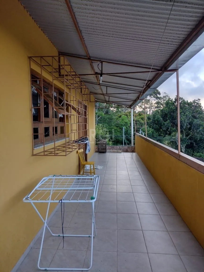 Imagem Casa para Venda - 0.18m², 2 dormitórios, sendo 2 suites, 3 vagas - Lomba do Pinheiro