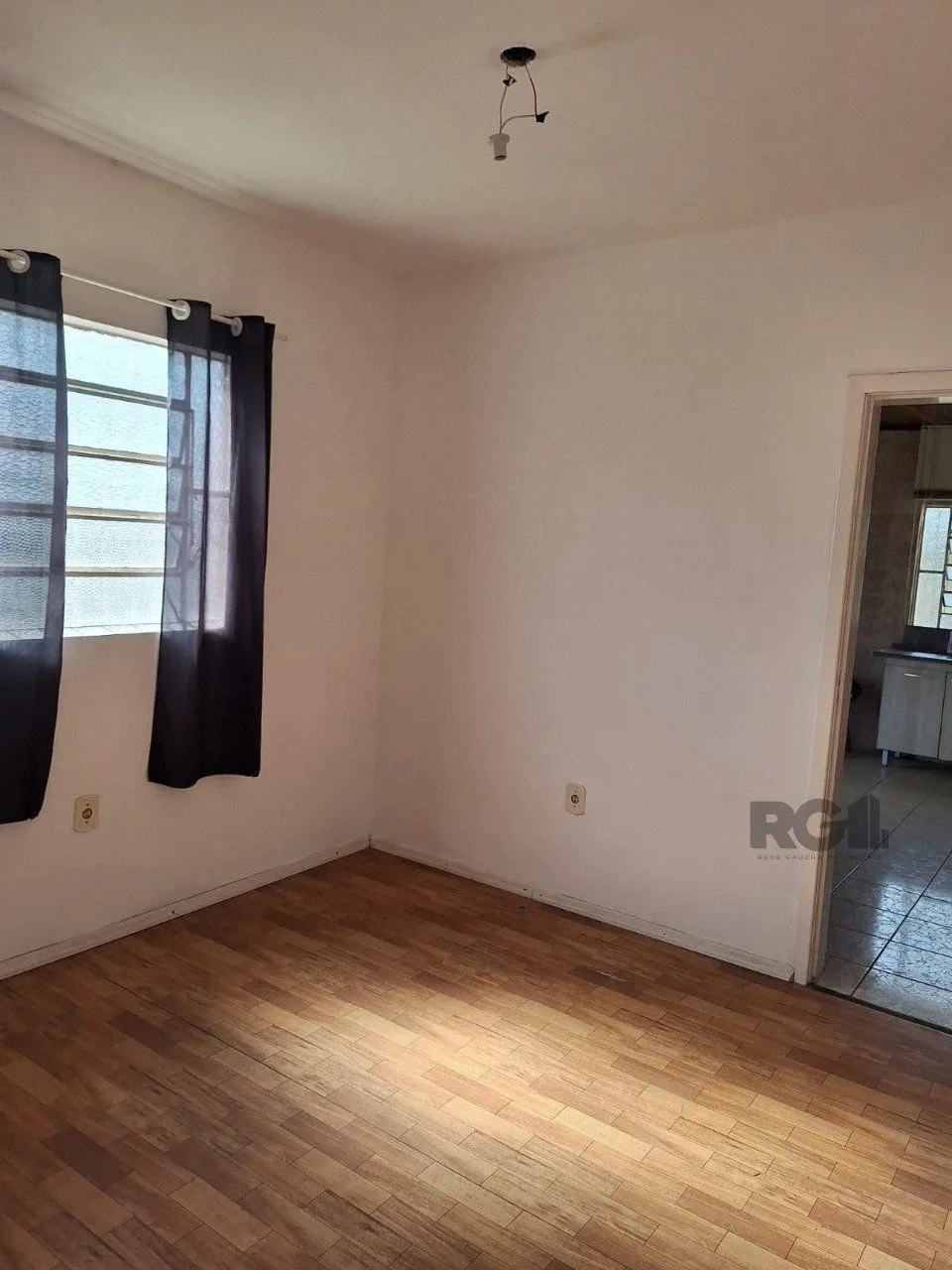 Imagem Terreno com casa com 3 quartos, vaga de garagem, no bairro Ipanema, Porto Alegre/RS