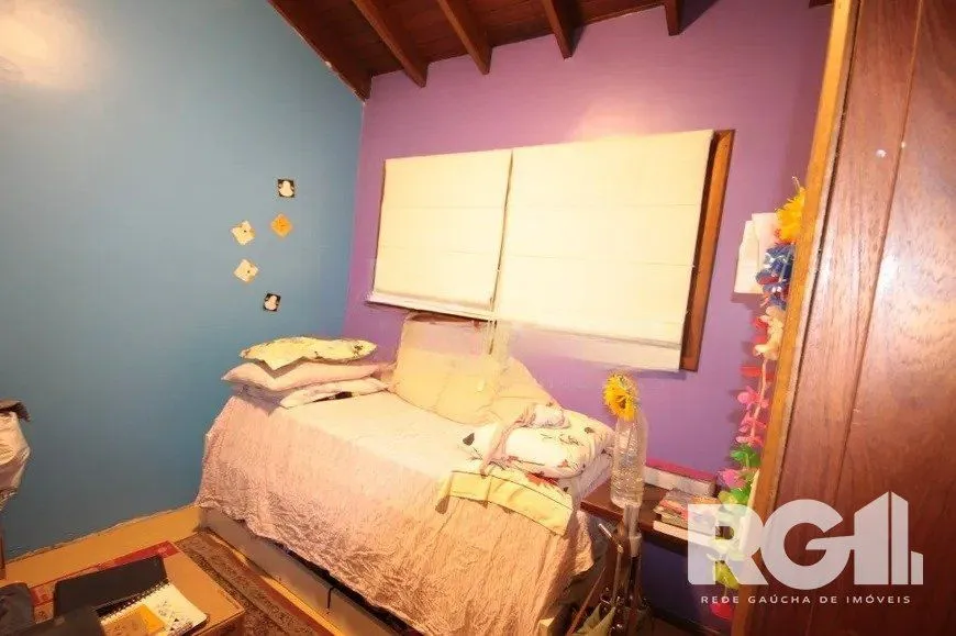 Imagem Casa residencial com 3 dormitórios 90m² privativos, e 2 vagas à venda no bairro Parque Santa Fé em Porto Alegre