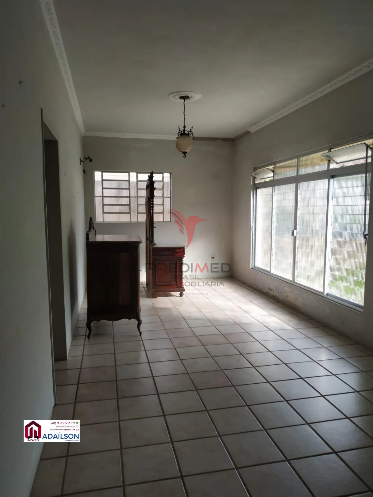 Imagem Casa em Florianópolis com 4 Quartos e 2 banheiros à Venda, 141 m² por R$ 1.490.000