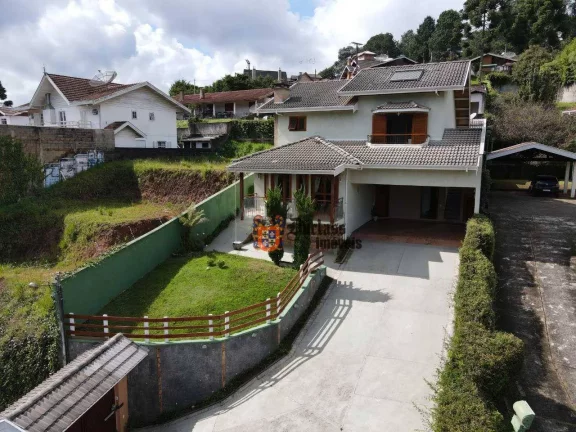 Imagem Casa com 3 dormitórios à venda, 285 m² por R$ 1.250.000,00 - Jardim Toriba - Campos do Jordão/SP