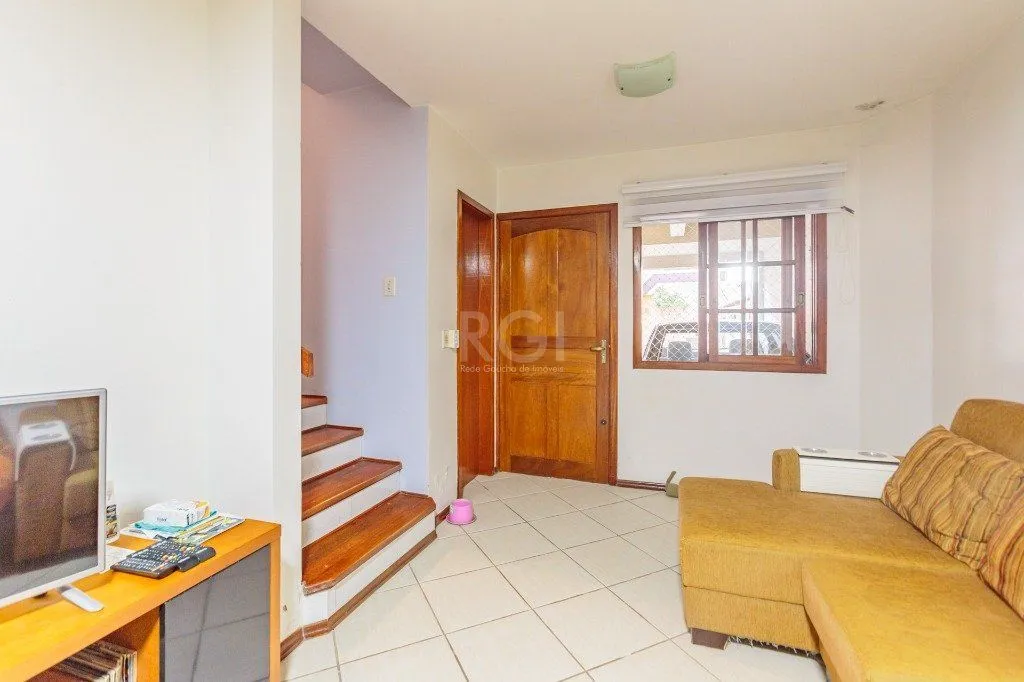 Imagem Casa 160m² - 3 dormitórios, 1 suíte, churrasqueira, terraço e 2 vagas de garagem no Guarujá