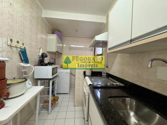 Imagem Apartamento de 2 quartos na Prainha, Caraguatatuba-SP 1 suíte, 2 salas, 2 banheiros, 1 vaga de garagem e vista para o mar