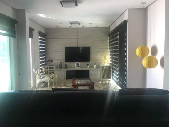 Imagem CASA COM 4 SUÍTES NA RUA 01 JOCKEY, CONDOMÍNIO FECHADO COM PORTARIA 24 HORAS, LOTE QUITADO E ESCRITURADO