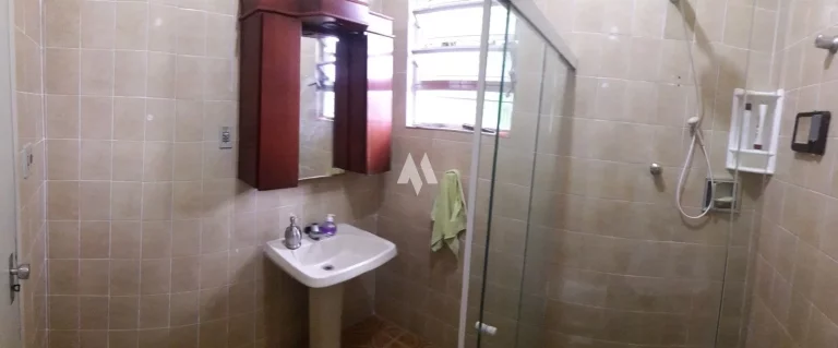 Imagem Casa à Venda no Centro de São Vicente– 307,73m², 4 Quartos, 1 Suíte, 4 Banheiros e Área de Festas