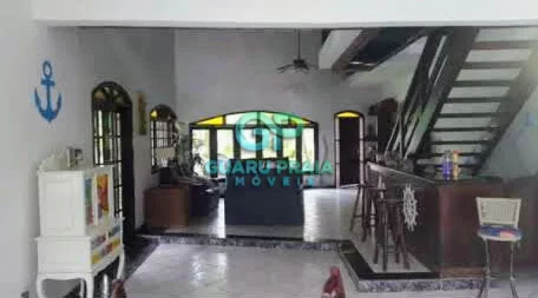 Imagem Casa com 6 quartos sendo 4 suítes, sala de jantar, sala de estar, sala de TV, 5 banheiros, cozinha armário planejado, lavanderia, churrasqueira, piscina, lindo jardim arborizado
