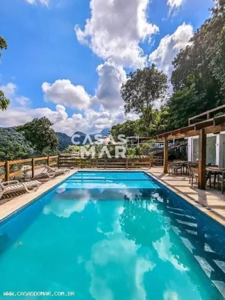 Imagem Casa de luxo à venda no Jardim Botânico, Rio de Janeiro - 5 quartos, 5 suítes, 8 banheiros, 2 vagas de garagem, 300,00 m².