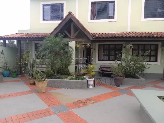 Linda casa em condomínio fechado - segurança, conforto e qualidade de vida, com aproximadamente 11...