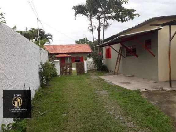 Terreno 1100M² com 4 casa e 2 lojas