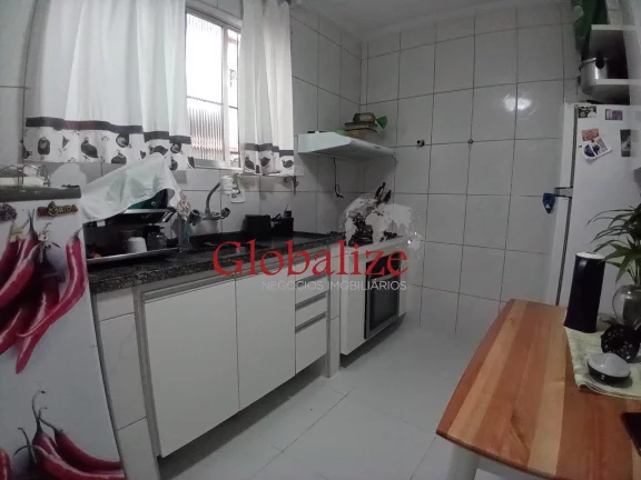Imagem Casa em Vila à venda com 2 quartos, 2 banheiros, churrasqueira na Vila Mathias em Santos por R$426.000,00