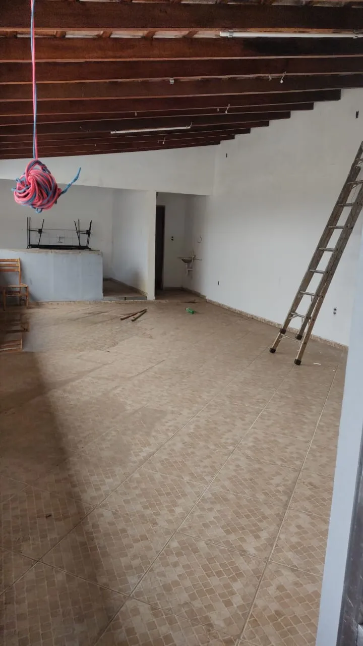 Imagem Sobrado com 4 Dormitórios e Terraço Gourmet em Localização Privilegiada