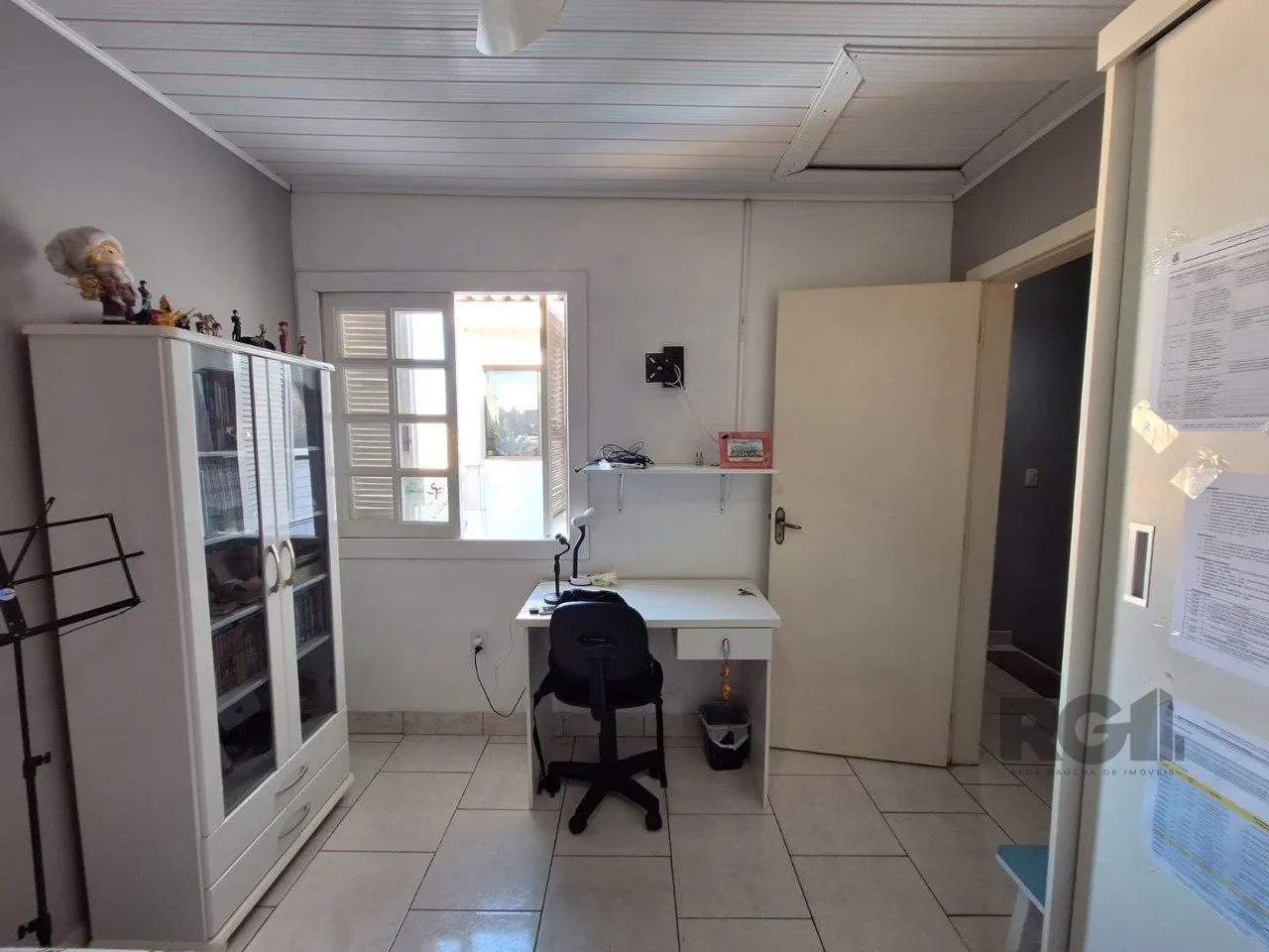 Imagem Casa com 3 dormitórios, suíte, lareira, Jardim Algarve em Alvorada - RS.