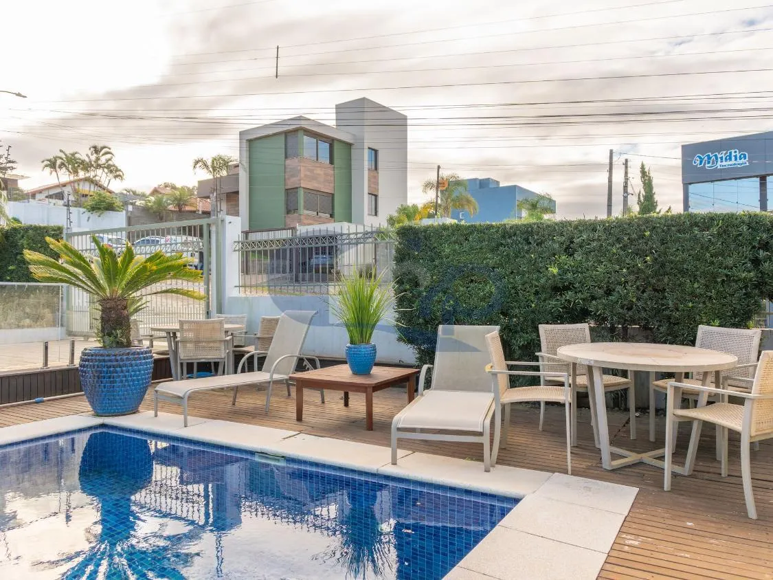 Imagem Casa de Alto Padrao com 4 Dormitorios, Piscina Aquecida e Espaço Gourmet no Centenario, em Torres/RS