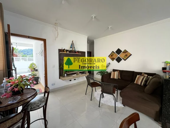 Imagem Ótima Casa à Venda na Martim de Sá em Caraguatatuba-SP - 3 quartos, 1 suite, 2 salas, 3 banheiros, 2 vagas, 102m²!