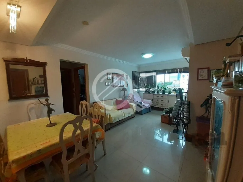 Imagem Apartamento de dois dormitórios sendo um suíte, living dois ambientes com churrasqueira, cozinha e...