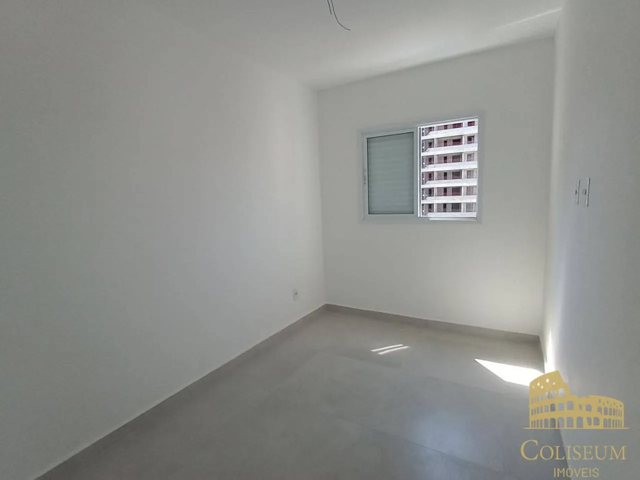 Imagem Apartamento com 2 dormitórios para alugar, 61 m² por R$ 3.300/mês - Guilhermina - Praia Grande/SP