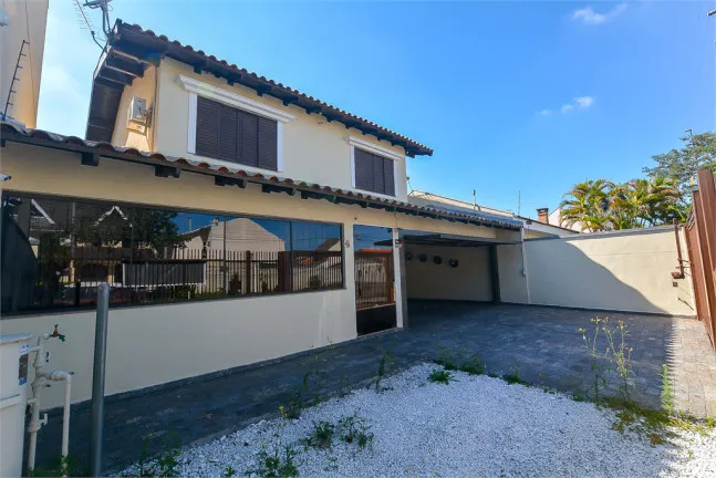 Imagem Casa com 3 Quartos à Venda, 271 m² em Jardim das Américas - Curitiba