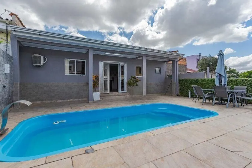 Imagem Casa térrea com 3 dormitórios, espaço gourmet e 3 vagas.