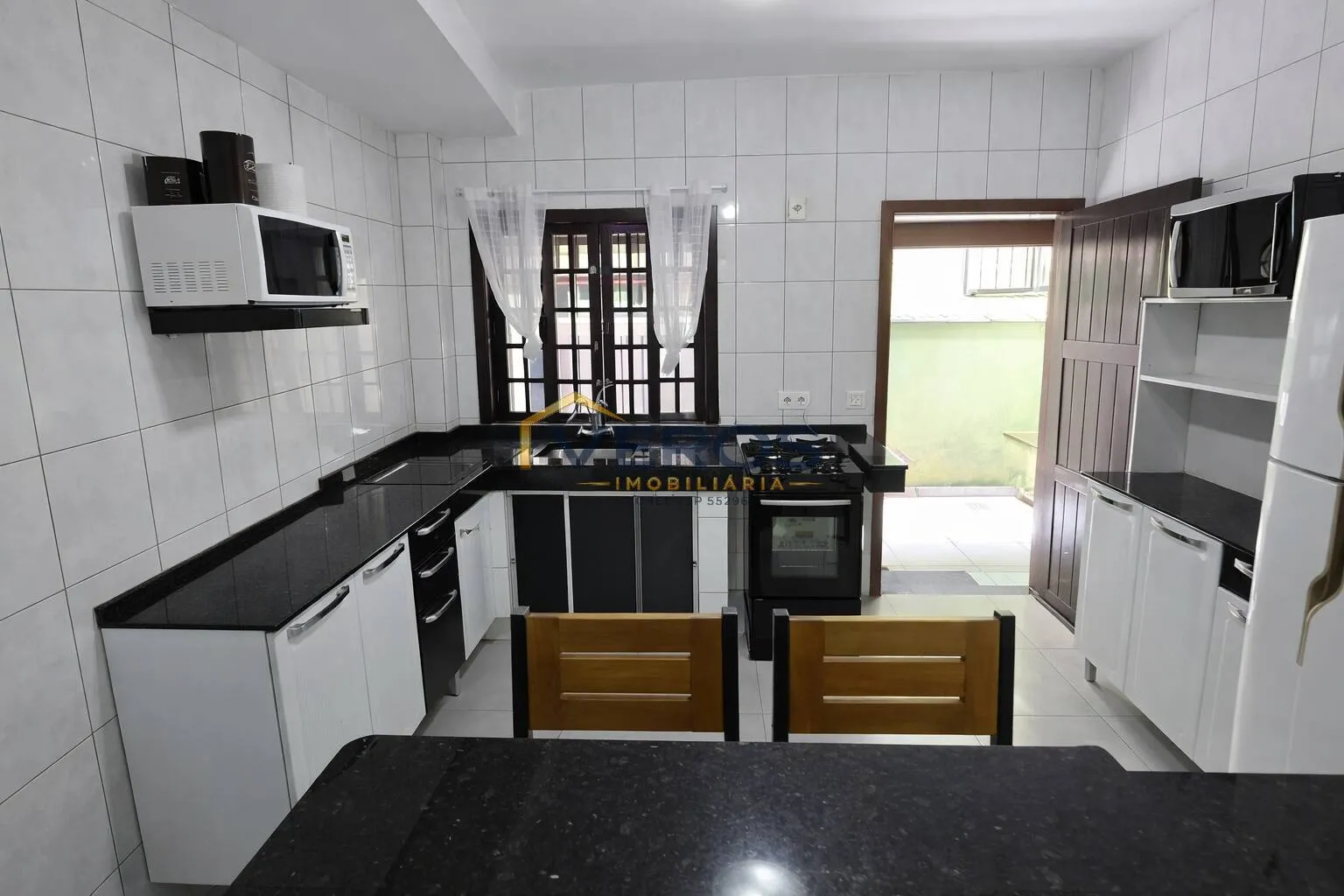Imagem Casa em condomínio a venda na Martim de Sá com 2 suítes a 500m da praia