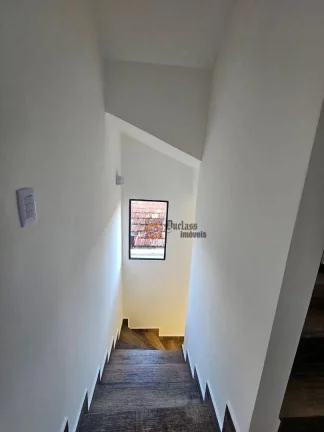 Imagem Sobrado com 3 dormitórios à venda, 100 m² por R$ 570.000,00 - Maracanã - Praia Grande/SP