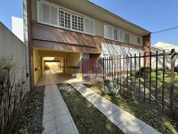 Imagem Casa de Alvenaria Residencial e Comercial à venda no bairro Vila Izabel em Curitiba.