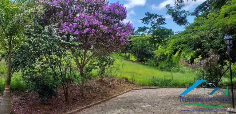 Imagem Vista espetacular e segurança: seu terreno te espera em Paraisópolis!