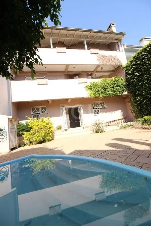 Imagem Casa para comprar com 4 dormitórios, 330m² - Chácara das Pedras - Porto Alegre