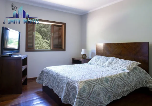Imagem MANSÃO ESPETACULAR, COM VISTA PRO CAMPO DE GOLF. PISCINA,ADEGA, 9 SALAS.