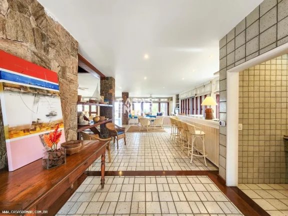 Imagem Magnífica casa de frente para o mar em condomínio de luxo em Geribá, Búzios-RJ: 6 quartos, 6 suítes, 6 salas, 7 banheiros, 4 vagas e 800m² de puro requinte!