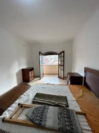 Imagem Sobrado com 3 dormitórios à venda, 147 m² por R$ 650.000 - Tupi - Praia Grande/SP