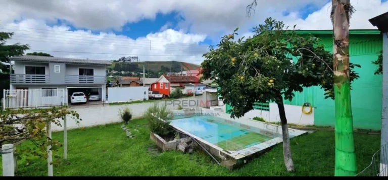 Imagem Casa de madeira, em Lages, Bairro São Luiz,esquina, dois quartos