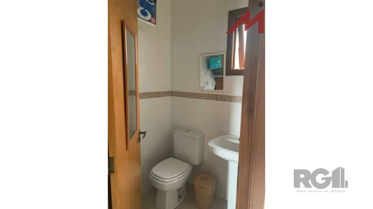 Imagem Sobrado em Trmandai com 2 suirtes, 2 banheiros, 1 vaga, churrasqueira e varanda.