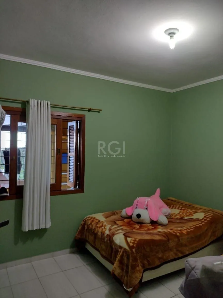 Imagem Casa para Venda - 0.18m², 2 dormitórios, sendo 2 suites, 3 vagas - Lomba do Pinheiro