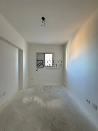 Imagem Apartamento de 2 dormitórios sendo 1 suíte, prédio frente mar no bairro Vila Mirim - Praia Grande