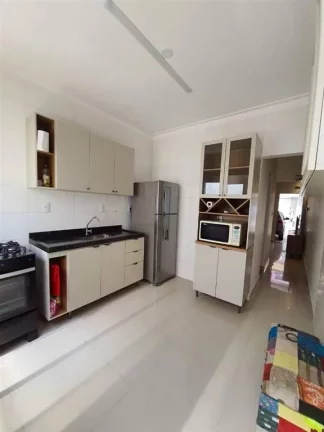 Imagem Casa com 2 dormitórios à venda, 70 m² por R$ 398.000 - Caiçara - Praia Grande/SP